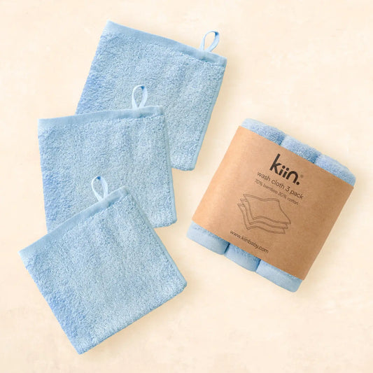 3 Pack Wash Cloth- Sky Blue, three laid out then rolled and packed