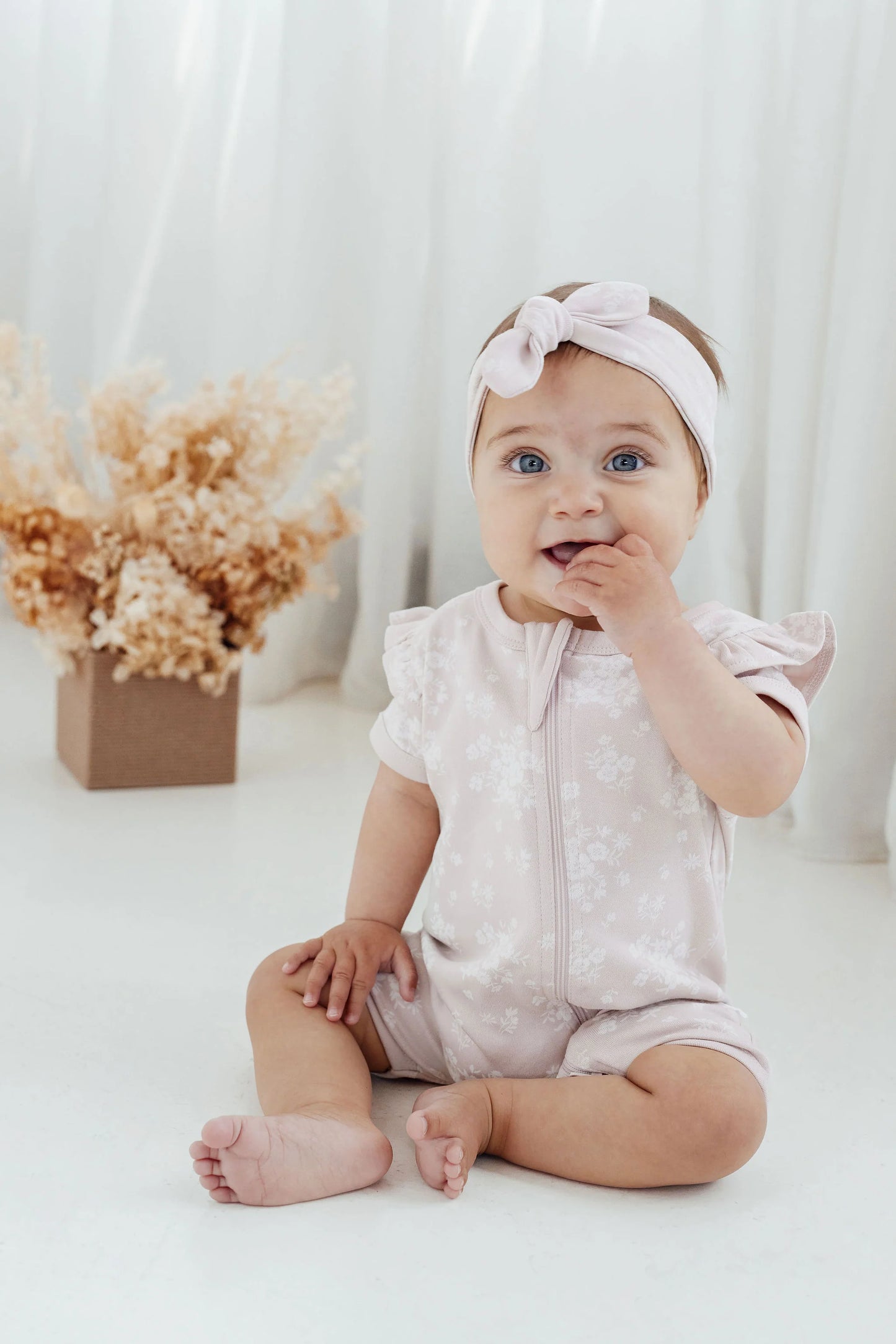 Aster and Oak  - Eve Floral Short Sleeve Zip Romper